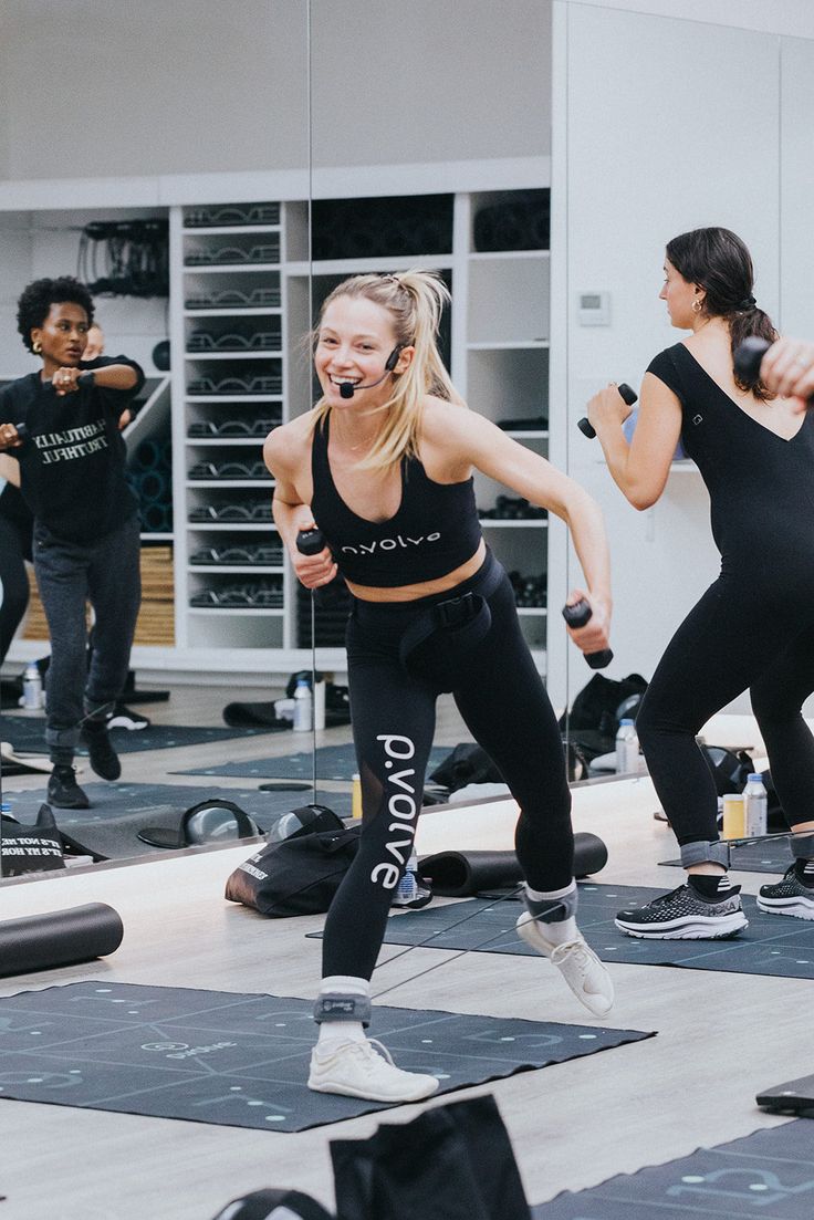 Gym instructor teaching a HIIT class