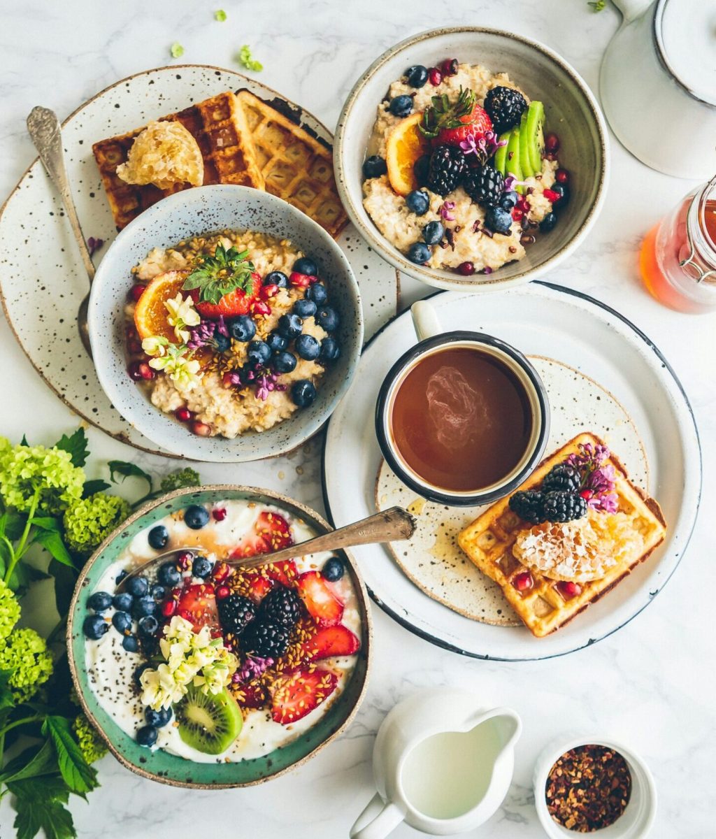 Healthy foods. Yogurt and granola, oats, fruit, salad